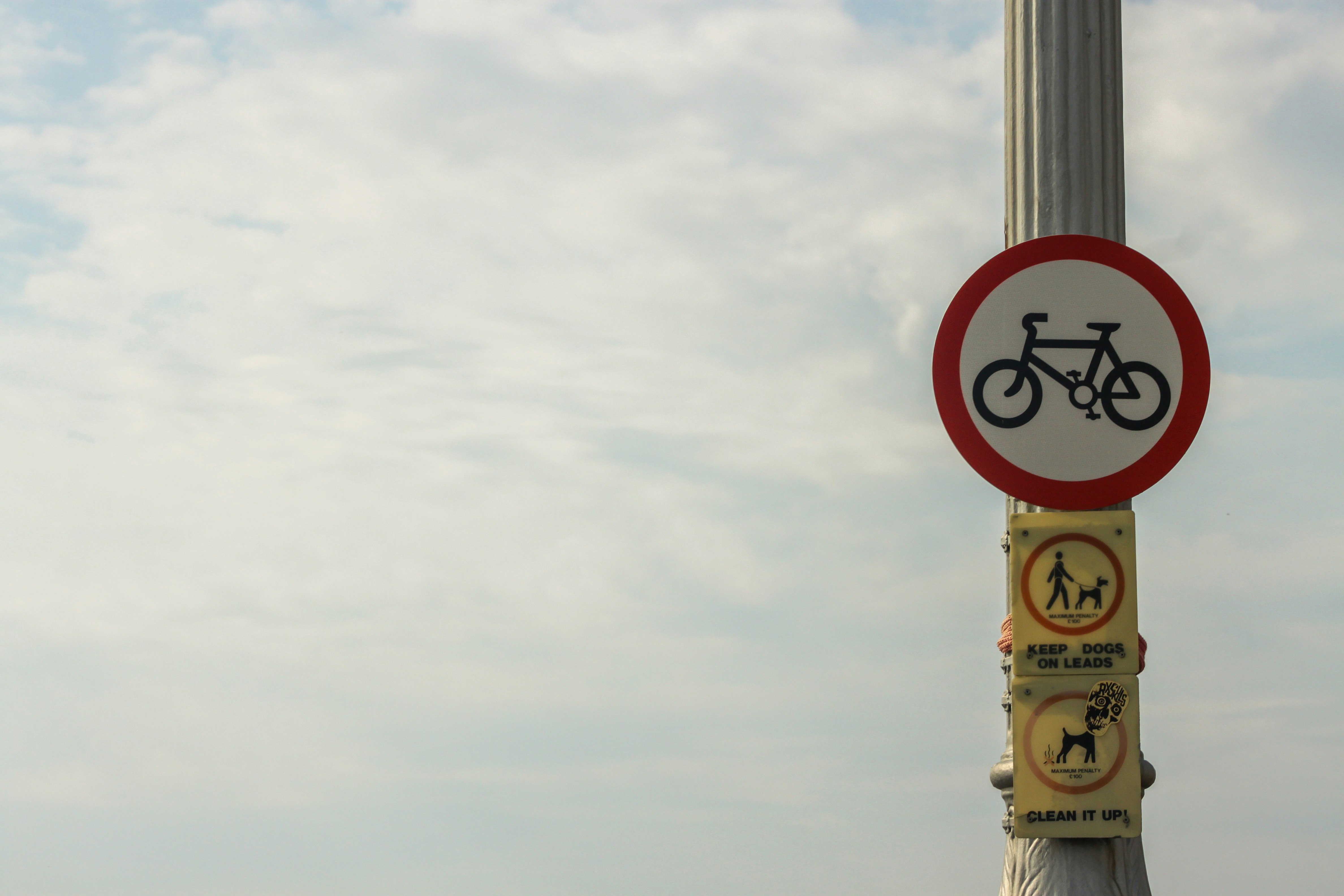 white and red no smoking sign